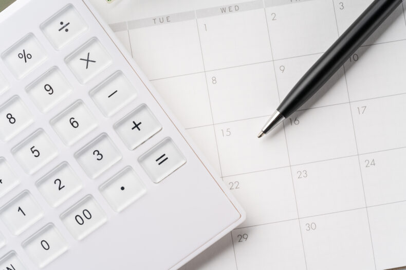 Calendar, calculator and ballpoint pen